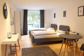 Moderne 1-Zimmer Wohnung mit Terasse, Küche, Bad mit Dusche, TV & WIFI